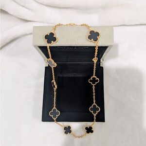 Clover necklace black and gold 18k gold plated finish comes w gift packaging